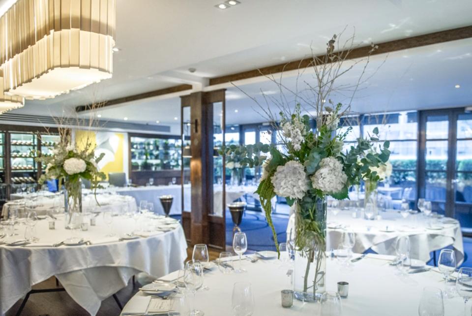 Winter wedding flowers, white hydrangea and eucalyptus garlands