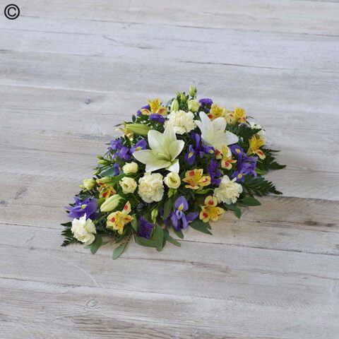 Funeral Florist’s Choice Lemon and Blue Spray